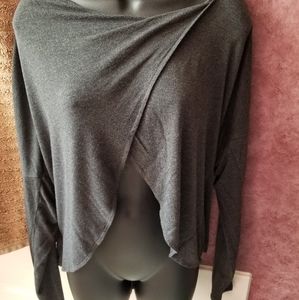 Women’s long sleeve open back champion shirt.